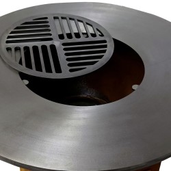 La grille centrale du brasero (incluse) Le Pétoncle mesure 39cm de diamètre.